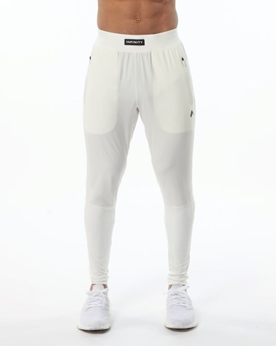 Alphalete Woven 4-Way Stretch 29" Pant Resin | CI8645972