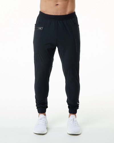 Alphalete Woven 4-Way Stretch 29" Pant Schwarz | OL9632578